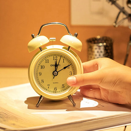 Enkelt beige retro vækkeur med klokker