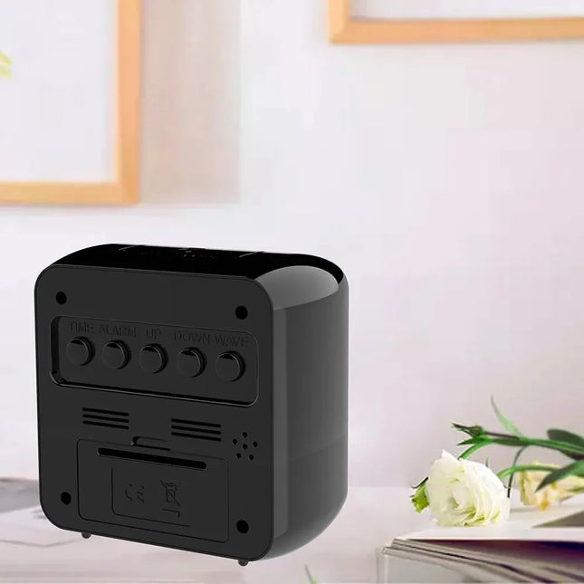 Kompakt digitalt rejsevækkeur med kalender