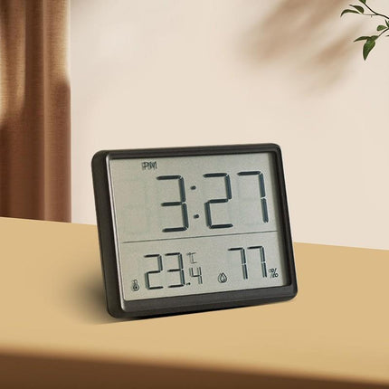 Slankt rejsevækkeur med termometer