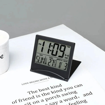 Lille foldbart digitalt rejsevækkeur