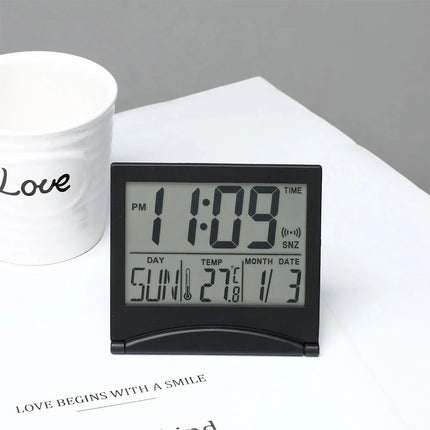 Lille foldbart digitalt rejsevækkeur