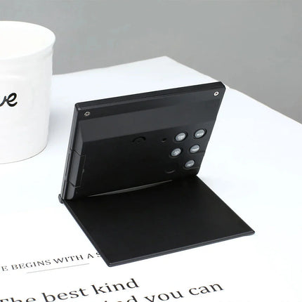 Lille foldbart digitalt rejsevækkeur