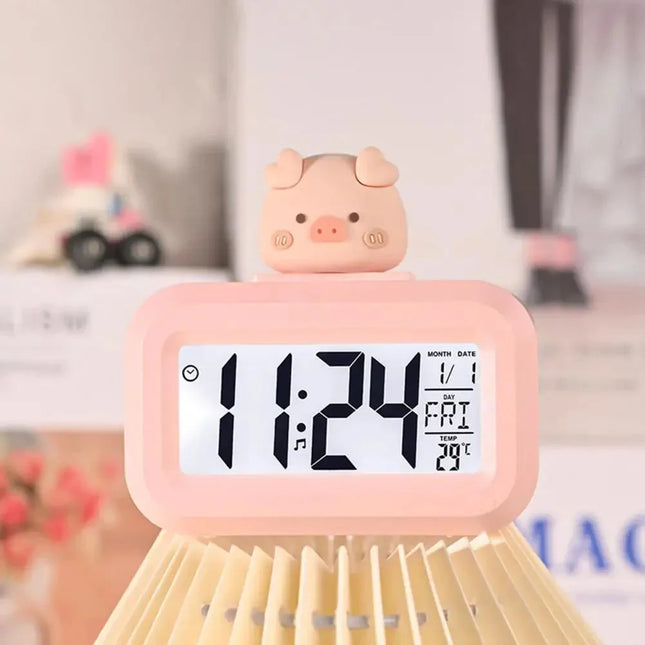 Pudderrosa digitalt vækkeur med gris