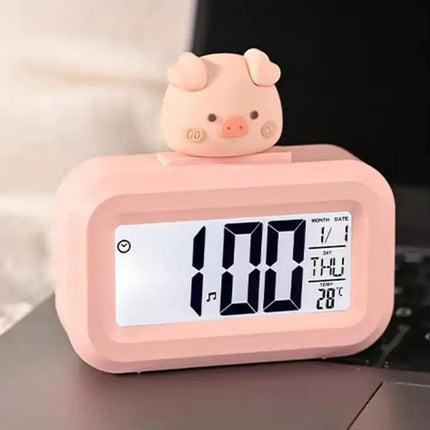 Pudderrosa digitalt vækkeur med gris