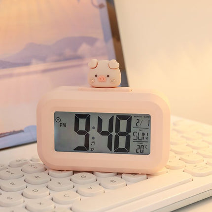 Pudderrosa digitalt vækkeur med gris