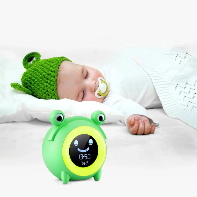Børnevækkeur og søvntræner som en frø