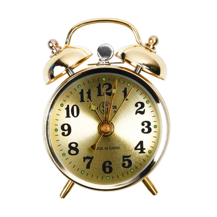 Guld mekanisk vækkeur med to klokker
