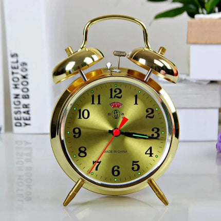 Vintage mekanisk vækkeur i guld finish