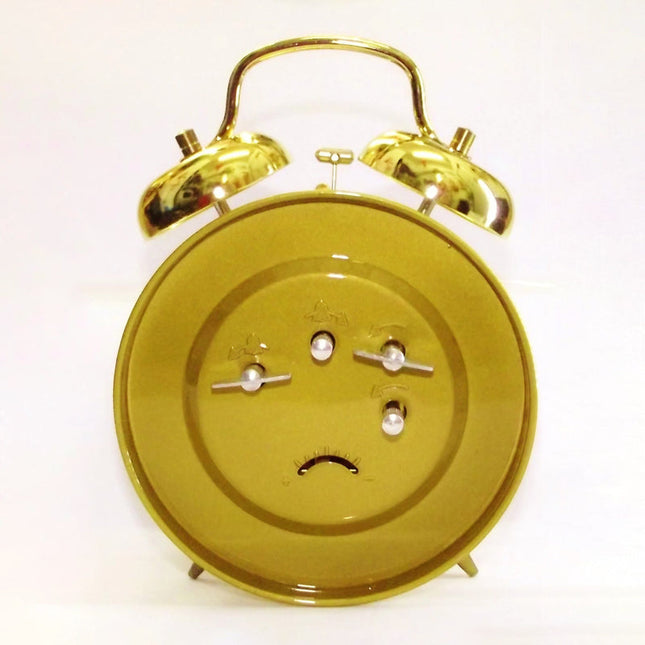 Vintage mekanisk vækkeur i guld finish