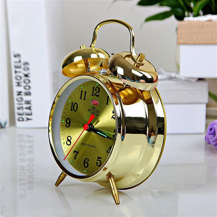 Vintage mekanisk vækkeur i guld finish