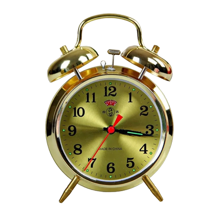 Vintage mekanisk vækkeur i guld finish
