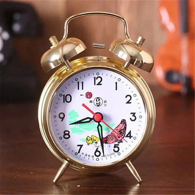 Mekanisk vækkeur med dobbeltklokke i guld