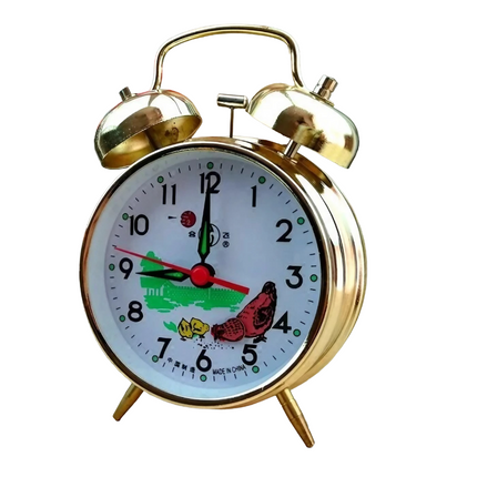 Mekanisk vækkeur med dobbeltklokke i guld