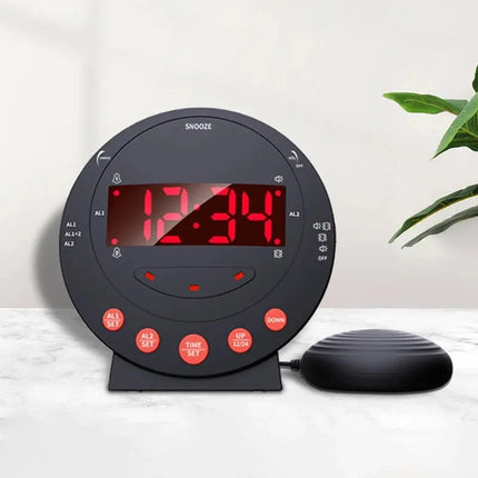 Sort vækkeur med sengevibrator