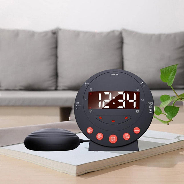 Sort vækkeur med sengevibrator