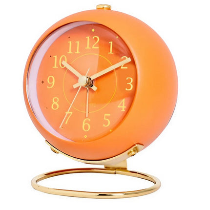 Orange vintage vækkeur på guld stander